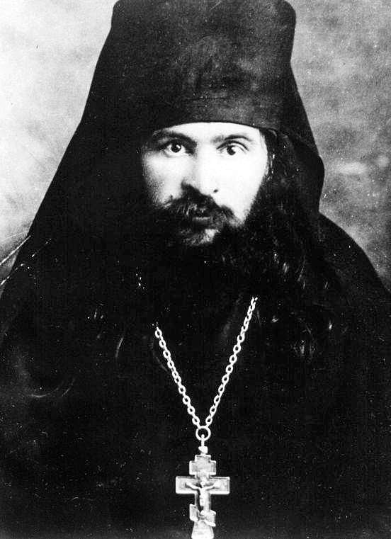Hieromonk John Maximovitch as a young monk in Belgrade in 1934, wearing the black monastic klobuk and a pectoral cross