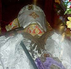 The incorrupt relics of Saint John of Shanghai, vested and lying in the shrine in the Holy Virgin Cathedral, San Francisco